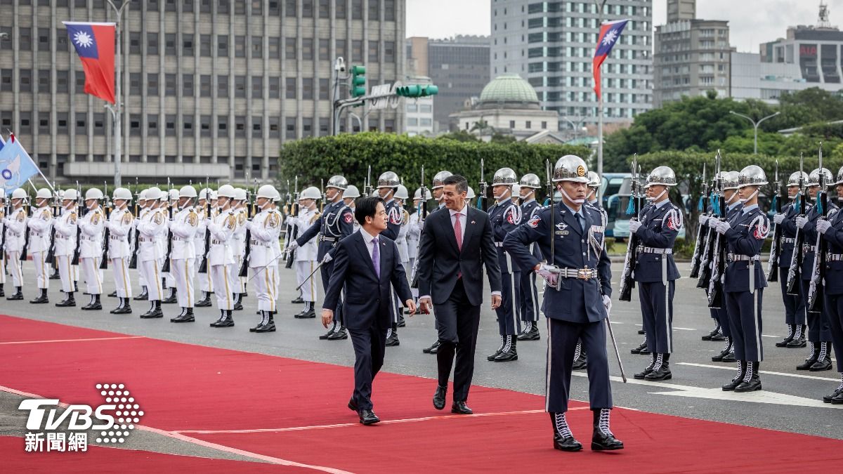 Taiwan greets Paraguay leader with 21-gun salute, honors